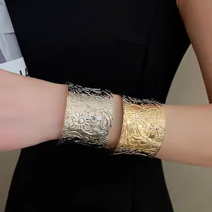 Bohemian style wide open metal cuff bracelet with vintage floral paisley embossed pattern