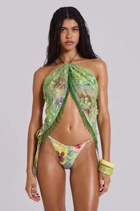 Detail of green sequin tassel halter top and floral print bikini bottoms beach set