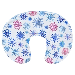 Close-up of soft C-shaped nursing pillow cover featuring blue and pink snowflake patterns