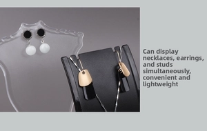Dual jewelry stand set showing a necklace and earrings on transparent and black displays
