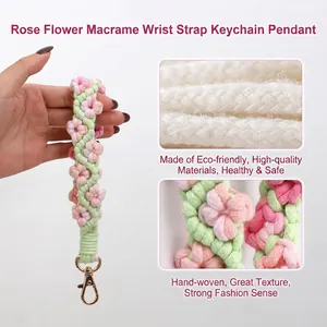 Handmade woven rose flower wristlet keychain with pink green cotton cord and gold clasp