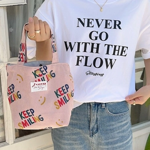 Pink corduroy tote bag with Keep Smiling print and smiley faces for casual use