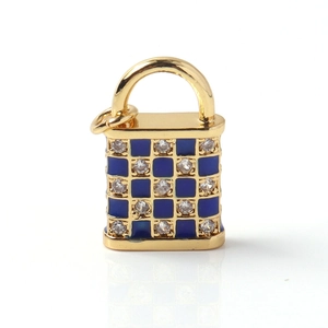 Detail of lock-shaped gold plated pendant with blue enamel checkerboard and white zircons