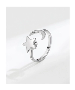 Macro shot of silver rotating star moon ring showing S925 hallmark engraving