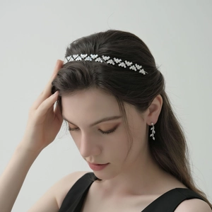 Elegant bridal silver tiara set with crystal geometric arrows and leaf drop earrings