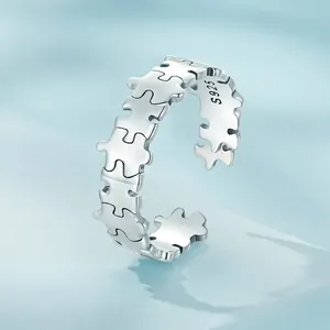Minimalist S925 sterling silver open ring featuring a unique jigsaw puzzle design