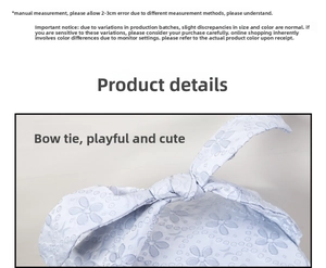 Detail of light blue jacquard makeup bag with a large decorative bow tie fastener