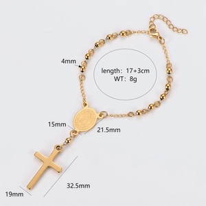 Gold stainless steel rosary bracelet with cross and Virgin Mary charms on white background