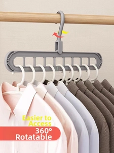 Detailed view of grey nine-hole clothes hanger showing 360-degree rotating hook and space-saving