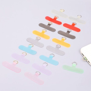 Universal PVC phone lanyard connector pads in assorted colors with metal D-rings