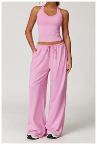 Pink yoga set featuring a halter slim-fit tank top and wide-leg drawstring pants