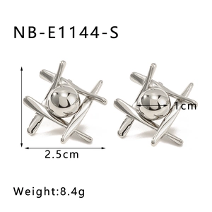 Detail view of silver geometric earrings with central sphere showing 2.5cm height
