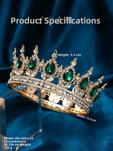 Detail view of golden luxury bridal crown with green gems and white crystal rhinestones