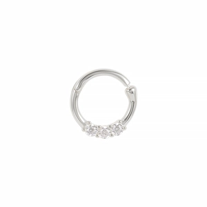 Macro shot of silver S925 hinged nose ring featuring five sparkling round-cut crystals