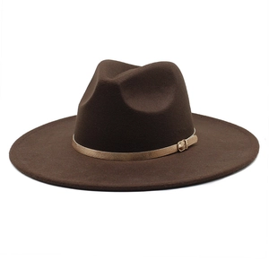 Detail of dark brown wool fedora with 9.5cm wide brim and thin leather band with buckle