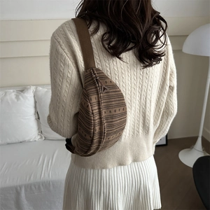 Brown woven crossbody chest bag for women in soft vintage style with adjustable strap