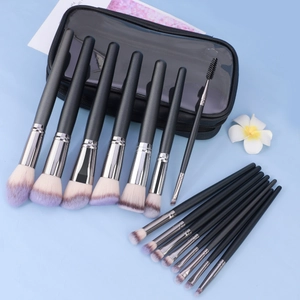Detailed set of 16 purple gradient makeup brushes with a clear waterproof black travel case