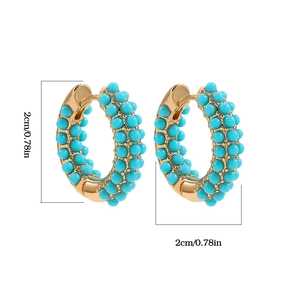 Detailed view of vintage gold hoop earrings with turquoise beads measuring 2cm in diameter