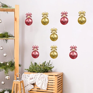 Christmas wall stickers featuring red and gold ornaments with snowflakes on white background