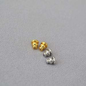 Golden and silver brass bullet clutch earring backs with silicone pads for DIY jewelry