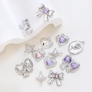 Silver metal pendants collection with bows, hearts and stars for DIY jewelry making