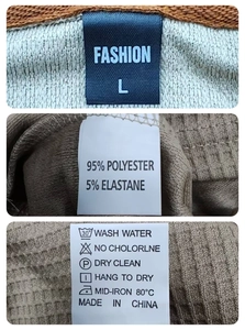 Detail view of garment care labels showing size L and polyester fabric composition