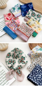 Detail of assorted floral cotton linen neck scarves with vintage patterns and textures