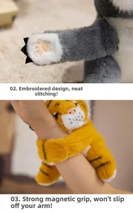 Detail of tiger plush bracelet showing neat embroidery and strong magnetic grip feature