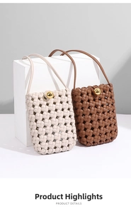 Detail of woven crossbody mini bag with gold ball clasp and textured PU leather pattern