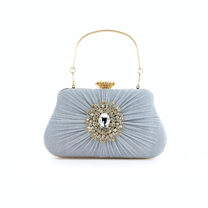 Elegant silver evening clutch bag with pleated fabric, crystal buckle, and gold metal handle