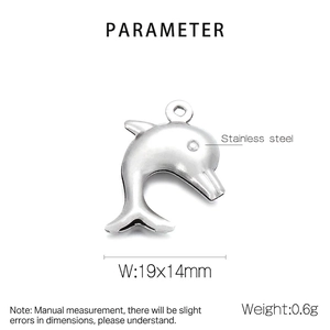 Macro detail of dolphin stainless steel charm showing 19x14mm size and 0.6g weight