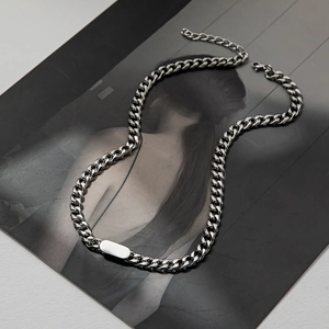 Sleek silver stainless steel Cuban link necklace with a minimalist rectangular tag pendant