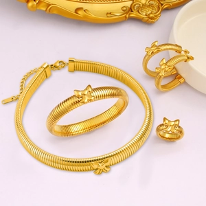 Parure de bijoux dorée avec nœud nervuré, collier, bracelet, boucles et bague