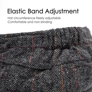 Grey herringbone wool newsboy cap showing the adjustable elastic band for custom fit