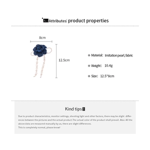 Detailed view showing product dimensions and fabric flower hair clip with imitation pearls
