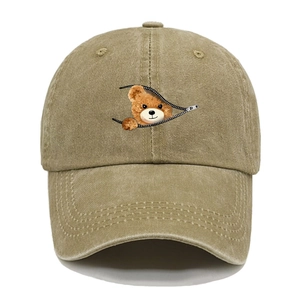 Detailed view of creative bear print peeking through zipper on cotton baseball cap