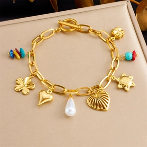 Bracelet à breloques en acier doré vintage avec fleurs, cœurs et perles colorées