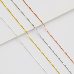 Detail showing S925 sterling silver box chains in silver, gold, and rose gold finishes