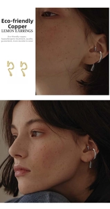 Detail of hypoallergenic copper ear cuff earrings showing sleek streamlined design and fit