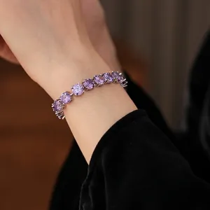 Sparkling silver buckle bracelet featuring round purple zircon in a luxury palace style