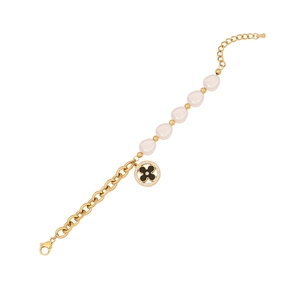 Golden bracelet with baroque pearls and round floral pendant on a white background
