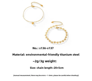 Detail view of 18K gold plated heart anklet set with adjustable chain extension