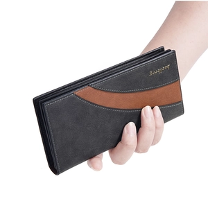 Close-up of long business wallet in dark grey and brown with metal baellerry logo
