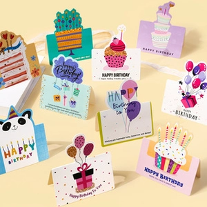 Detailed view of laser flash birthday card set featuring cake, panda, and gift designs