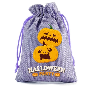 Close-up of purple burlap Halloween gift bag with pumpkin and textured linen weave