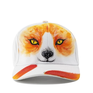 Close-up of hand-painted fox face design on a white six-panel baseball cap with red stripes