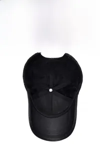 Detail of breathable inner lining and textured PU leather brim of men's baseball cap