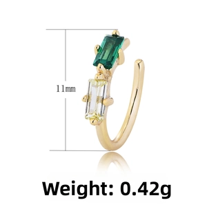 Detail of 11mm sterling silver ear cuff with emerald green and yellow zircon stones