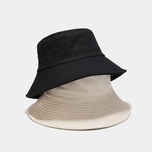 Wide brim bucket hat with windproof rope in black and beige for outdoor sun protection
