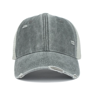 Close-up of grey washed denim trucker hat with breathable mesh and distressed details